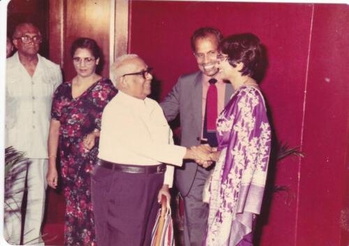 Old friend Johnny Muthiah being welcomed by Indra and Pathmanathan. Neighbours Mr & Mrs. Victor  Dana in the background