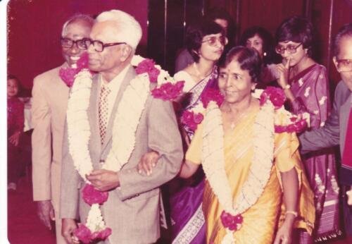 Grand entry. Daughters Indra and Gnanam in the background